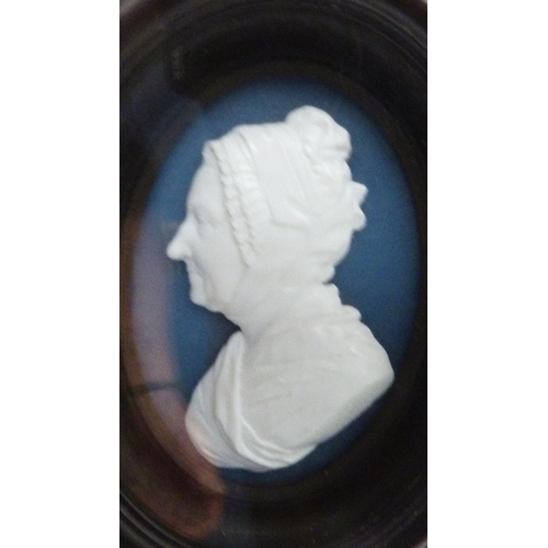 212 - James Tassie (Scottish, 1735 - 1799)Pair of white paste relief moulded portrait medallions depicting... 