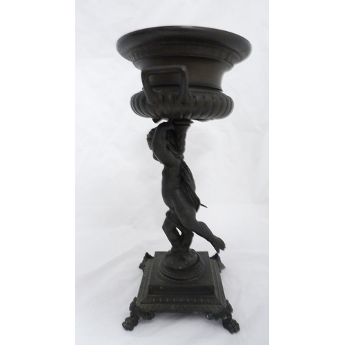 209 - Pair of Victorian Patent spelter urns, converted to table lamps, each raised aloft by a classical pu... 