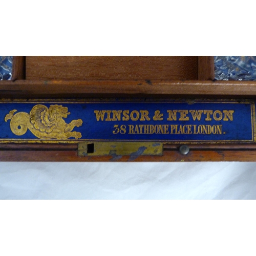 213 - Winsor & Newton mahogany artist's paint box, 19th century, the hinged cover with gilt printed la... 