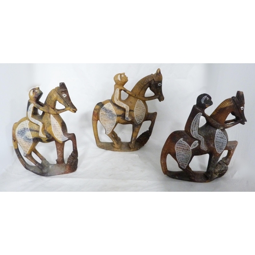 307 - Three carved soapstone Mbigou stone sculptures, origin Gabon, Africa, modelled as riders on horsebac... 