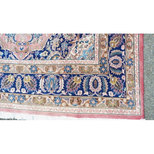 391 - Persian Heriz hand-knotted rug with all over foliage, on pink, beige and blue field, on red ground, ... 