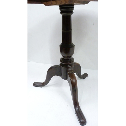 431 - George III mahogany snap-action supper table, with saucer top on turned baluster column and shaped t... 