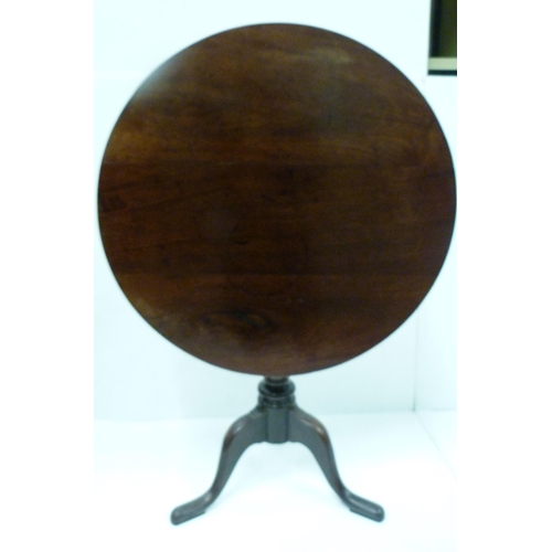 431 - George III mahogany snap-action supper table, with saucer top on turned baluster column and shaped t... 