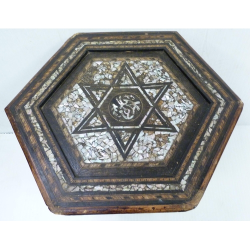 432 - Islamic specimen marquetry inlaid octagonal table, c. early 20th century, the top with marquetry cro... 