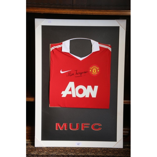 447 - Framed Manchester United football top with Alex Ferguson autograph signature, MUFC below, frame size... 