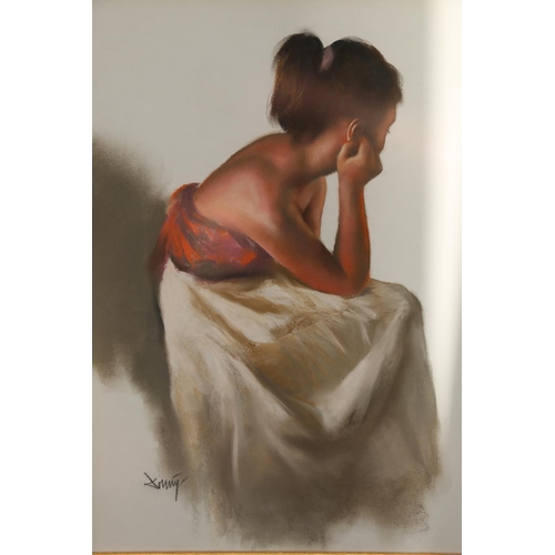 451 - DOMINGO (Spanish b1946), portrait of a young female, pastel painting, signed lower left, 60cm x 49cm... 