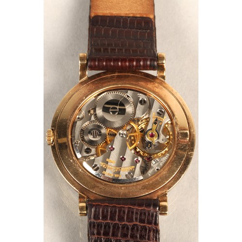 125 - Gents 9ct gold Jaeger-le-coultre wrist watch, on a brown leather strap.