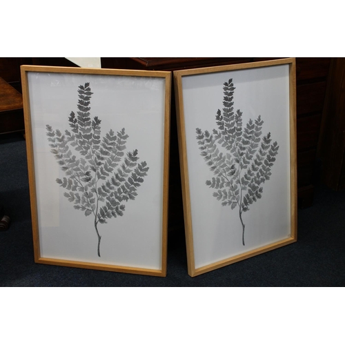 397 - Two large framed prints of leafy branches, sticker to the glass reads 'Danish Home Interior & De... 