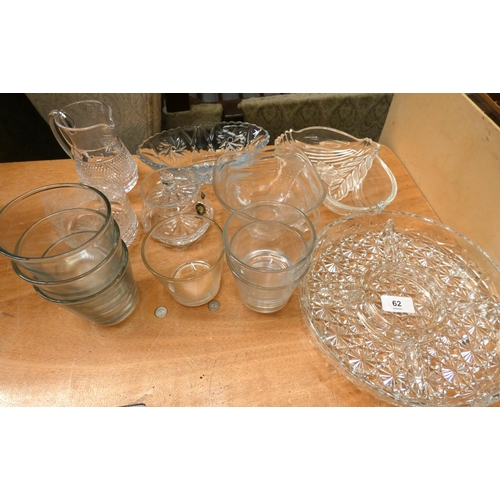 62 - Various glassware to include cups, jugs, bowls etc.