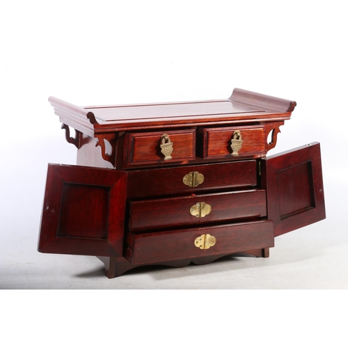 10 - Chinese wooden jewellery casket, 25cm high.