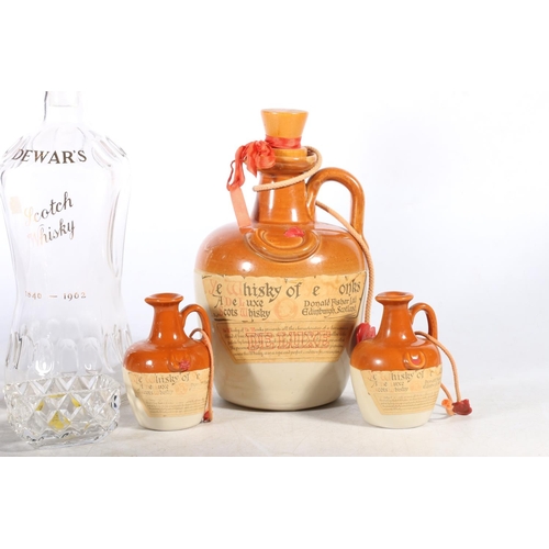 100 - Dewars Scotch Whisky glass decanter, pottery whisky decanters, glassware, etc.