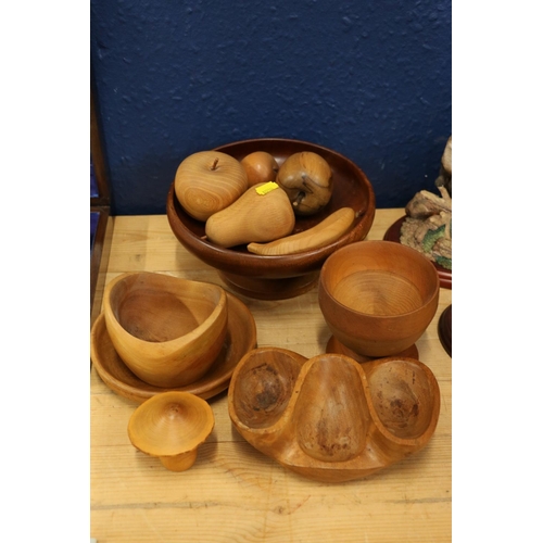 108 - Treen items to include carved fruit, a pipe bowl, etc.