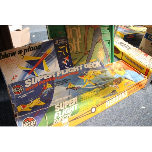 137 - Two Cushion rebound game, a Superflight Deck and a Blow-up toy, and other games.