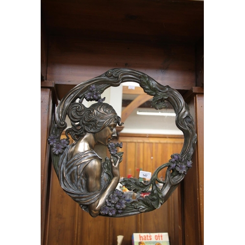 147 - Modern Art Nouveau style mirror, 50cm.