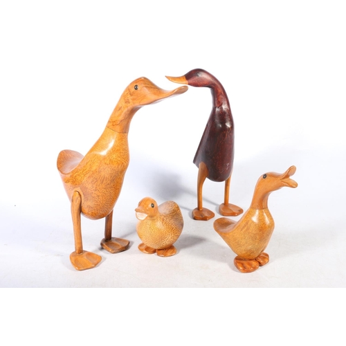 160 - Four treen models of ducks, largest 29cm.