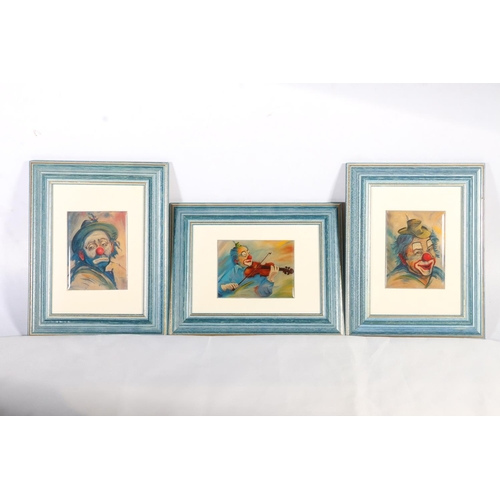 165 - Three French framed porcelain plaques of clowns.