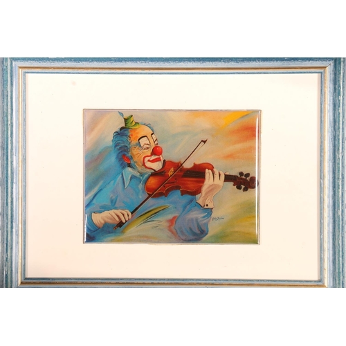 165 - Three French framed porcelain plaques of clowns.