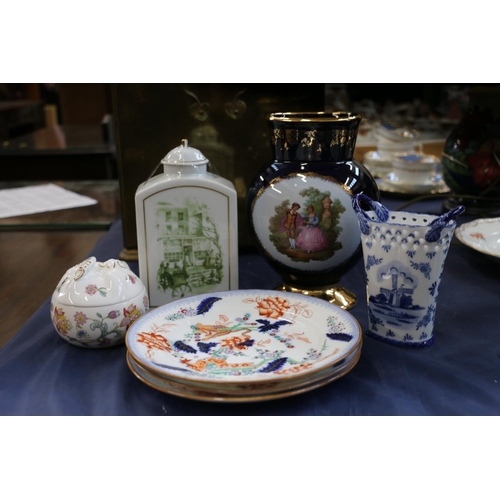 166 - Three Meissen Imari plates and four other pottery items.