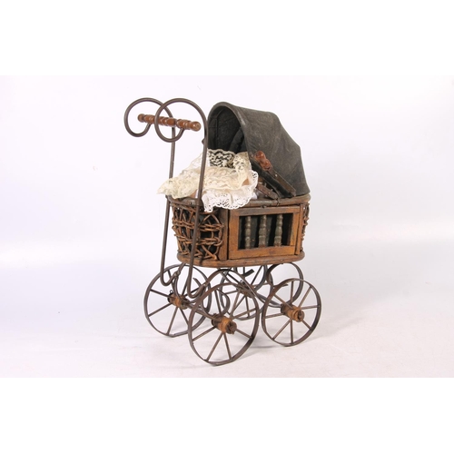 177 - Model of a doll's pram, 40cm high.