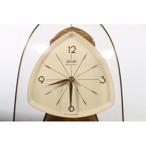 21 - Kundo electronic clock under plastic cover, 24cm high.