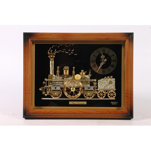 211 - Rhythm Quartz framed locomotive clock, 25cm wide.