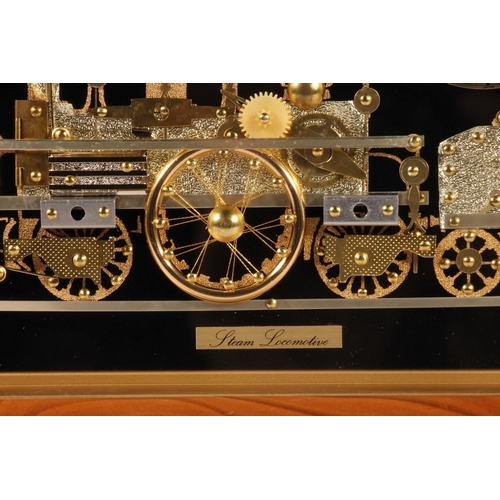 211 - Rhythm Quartz framed locomotive clock, 25cm wide.