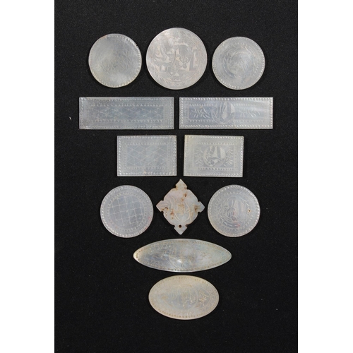 214 - Chinese engraved mother-of-pearl gaming tokens.