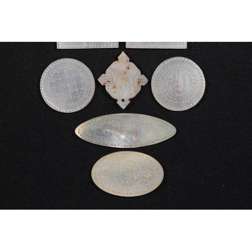 214 - Chinese engraved mother-of-pearl gaming tokens.