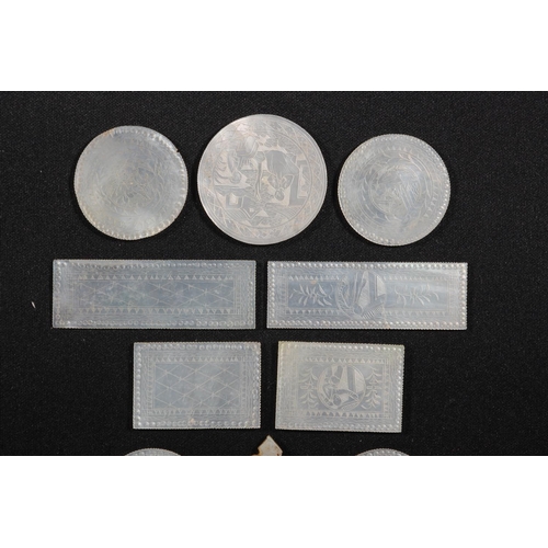 214 - Chinese engraved mother-of-pearl gaming tokens.