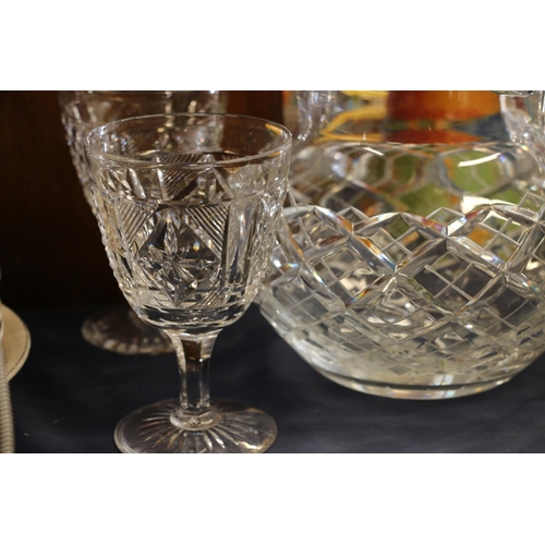 42 - Crystal vase and four crystal wine glasses.