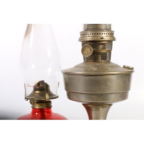 54 - Two vintage oil lamps.