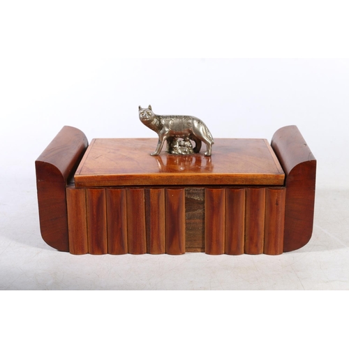 69 - Art Deco wooden cigarette dispenser with a Roman She-Wolf (Lupa) finial.