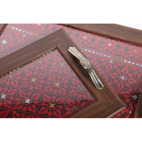 83 - Two wooden framed trays with tapestry insets under glass.