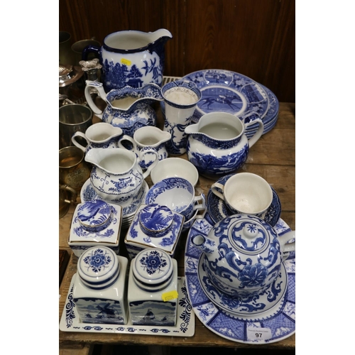 97 - Blue and white pottery to include jugs, plates, etc.