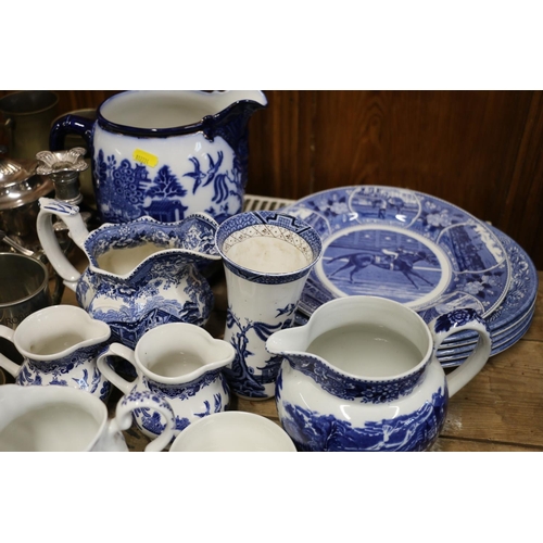 97 - Blue and white pottery to include jugs, plates, etc.