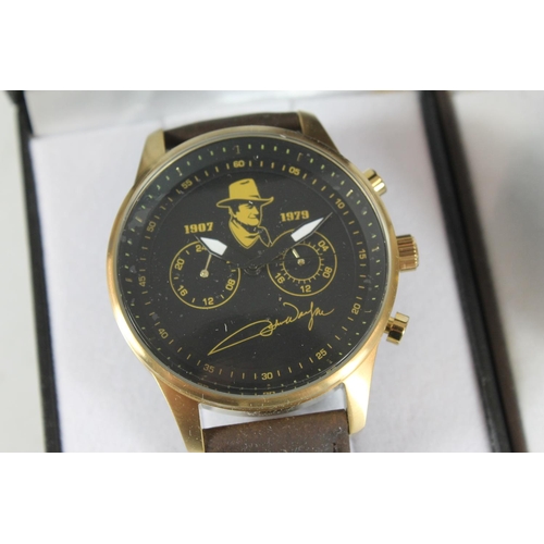 523 - Two John Wayne men wristwatches, boxed.