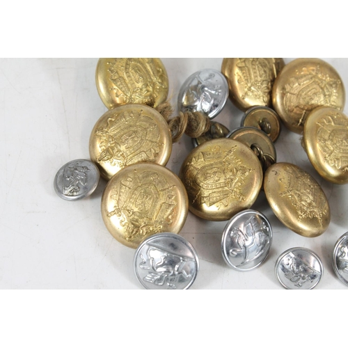 536 - Early 20thC French brass military uniform buttons, the back marked G and Cie. Paris 32, together wit... 