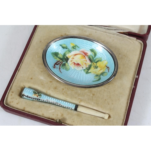 551 - Continental silver, floral painted guilloche enamel ashtray and cigarette holder, makers mark 'R&... 