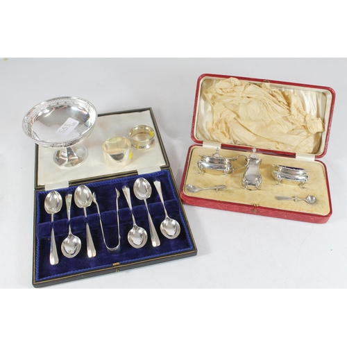 553 - Hallmarked silver teaspoon and sugar tongs set, silver cruet set, silver bon bon pedestal bowl and a... 