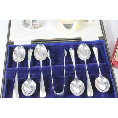 553 - Hallmarked silver teaspoon and sugar tongs set, silver cruet set, silver bon bon pedestal bowl and a... 