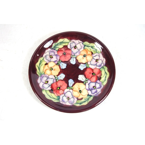 219 - Moorcroft Pansies plate.