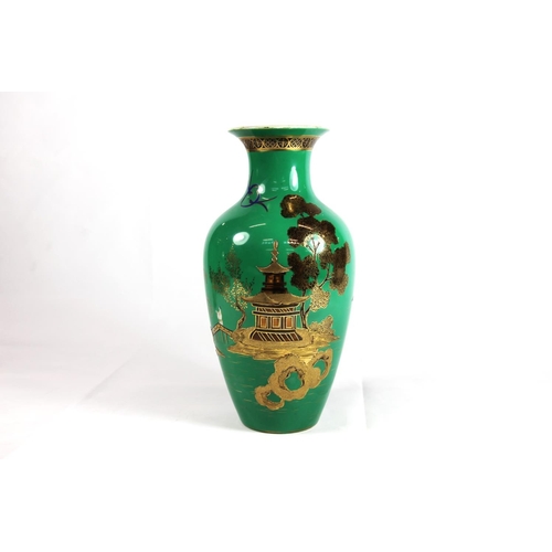 231 - Noritake baluster vase with green ground and gilt decoration, 26cm high.