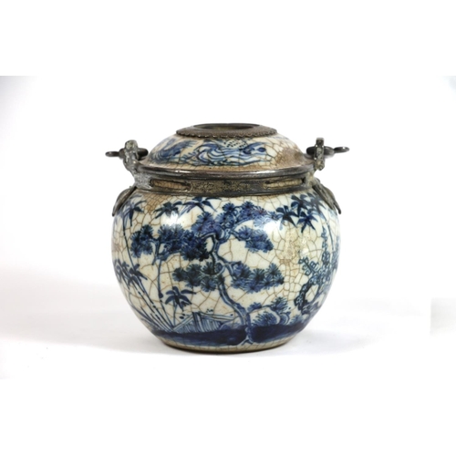 234 - Oriental blue and white pottery pot with metal handle and metal mounts in the form of hanging bats, ... 