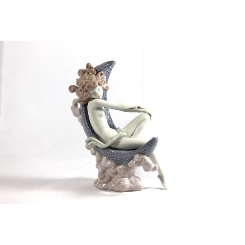 236 - Lladro Moon Glow figurine of a girl within crescent moon, 19cm high.