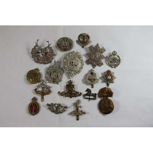 238 - Vintage military cap badges to include Sutherlands, Gordon Highlanders, Kings Own Scottish Borderers... 