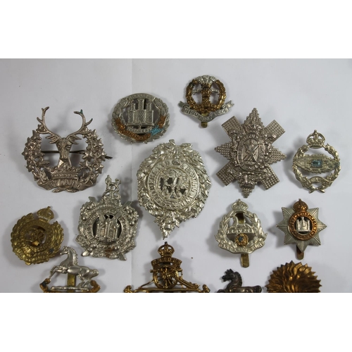 238 - Vintage military cap badges to include Sutherlands, Gordon Highlanders, Kings Own Scottish Borderers... 