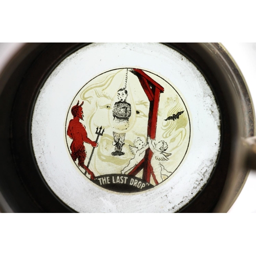 242 - Silver-plated tankard with glass base painted with the last drop devil's hangman scene.