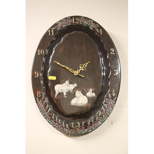 274 - Wall clock decorated with rams.