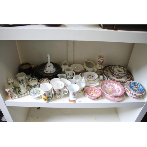 291 - Shelf containing decorative ceramics.