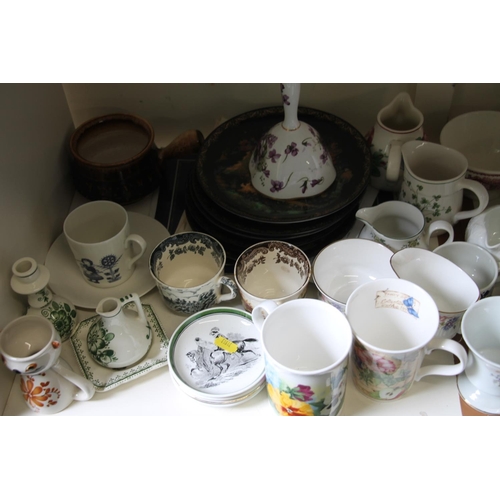 291 - Shelf containing decorative ceramics.